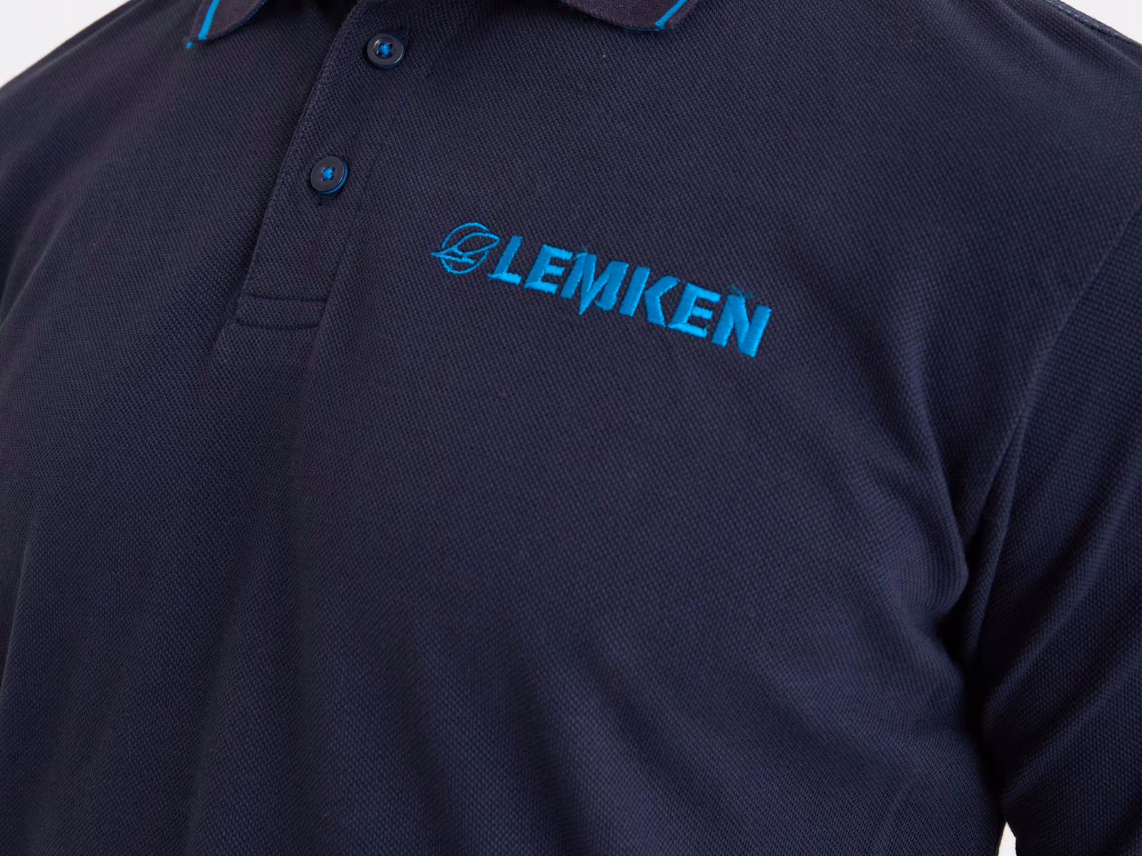 Polo blu navy in piqué con profilo a contrasto sul collo e logo ricamato sul petto